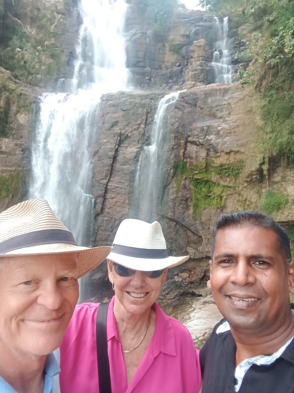 Tourists taking group selfie near trees and water – memorable Sri Lanka private journey