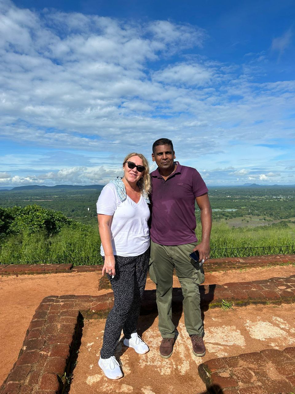 Smiling tourists group selfie in scenic Sri Lanka location – private tour memories