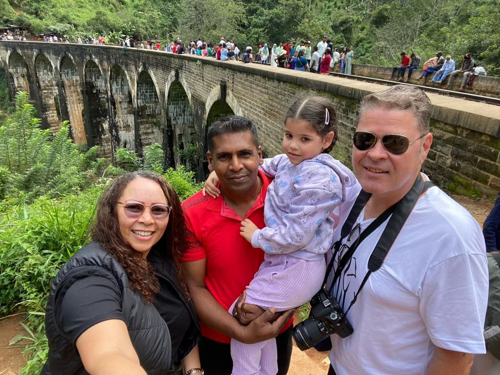 Green tuk-tuk in beautiful Sri Lanka landscape – local transport private tour